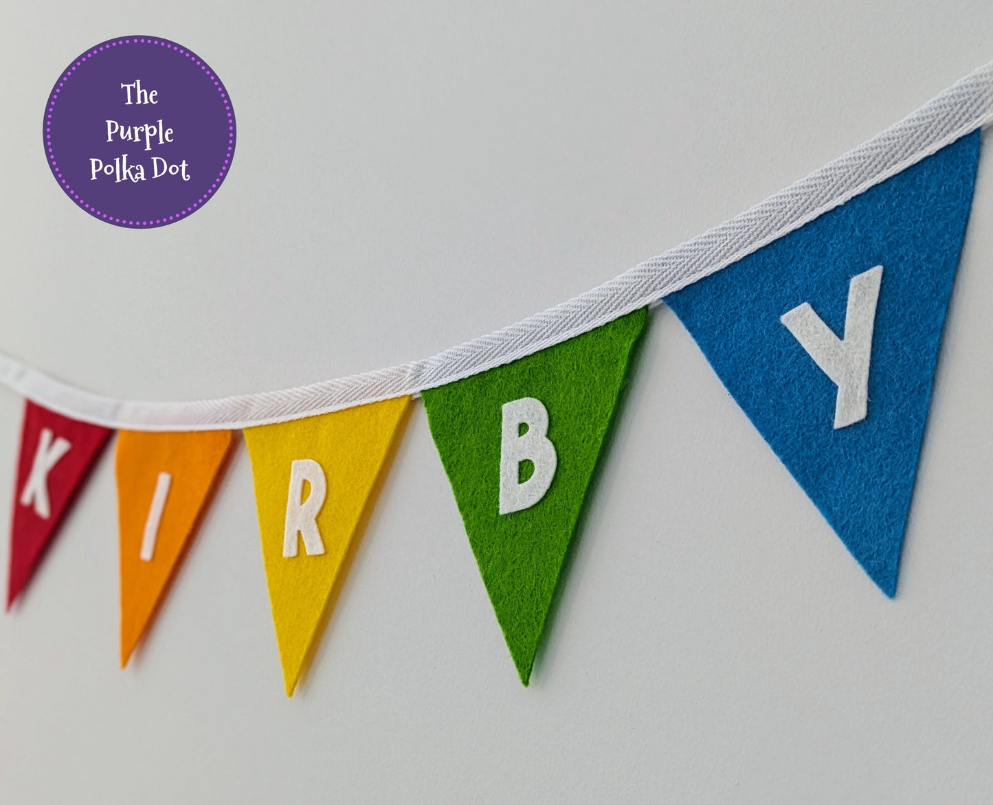 Custom personalised rainbow felt bunting with die-cut lettering