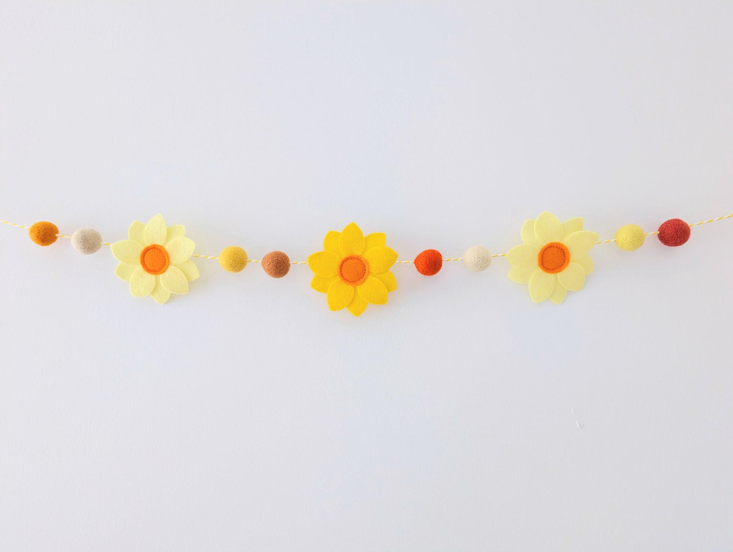 Yellow daffodil and felt ball garland: floral spring or Easter bunting