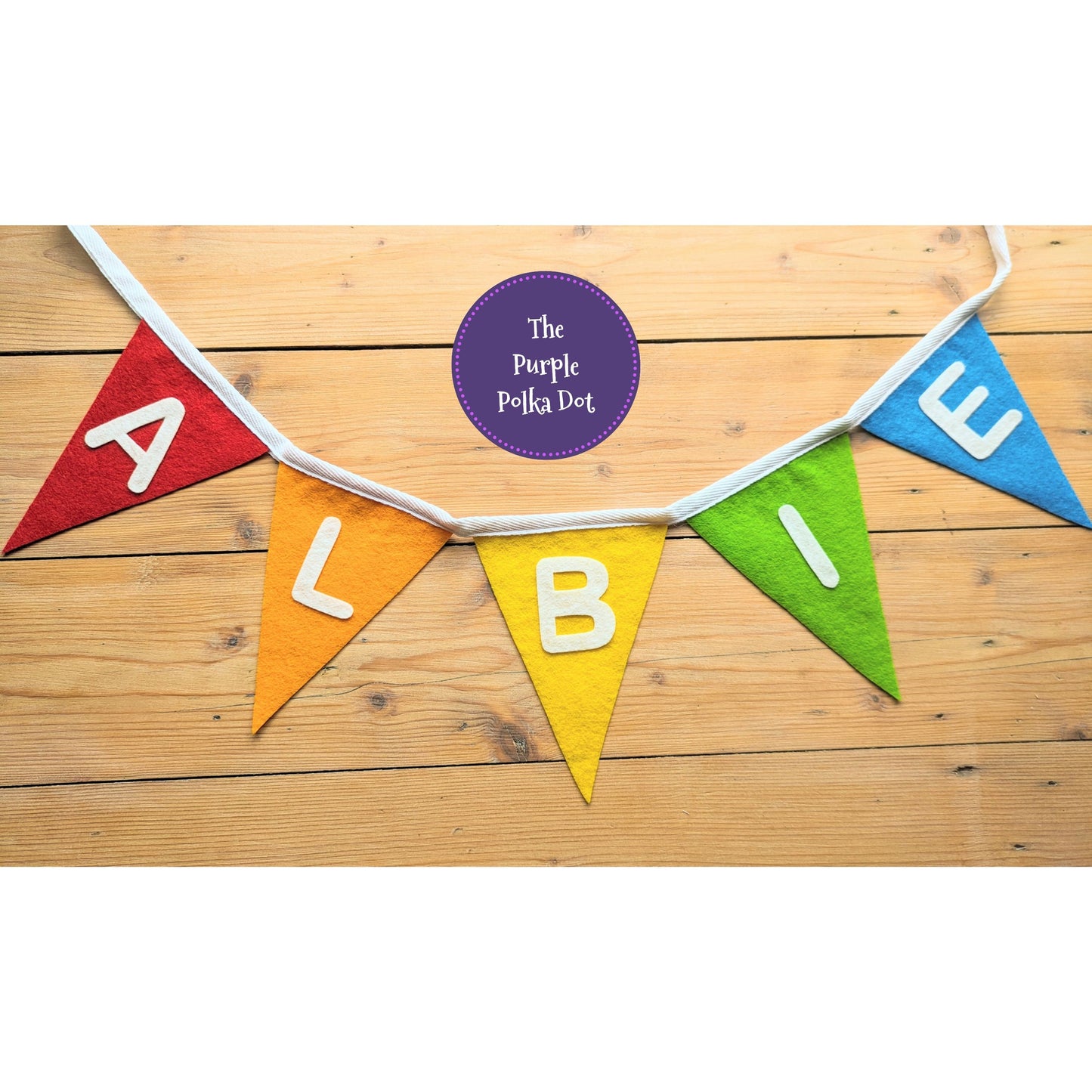 Custom personalised rainbow felt bunting with hand-cut lettering
