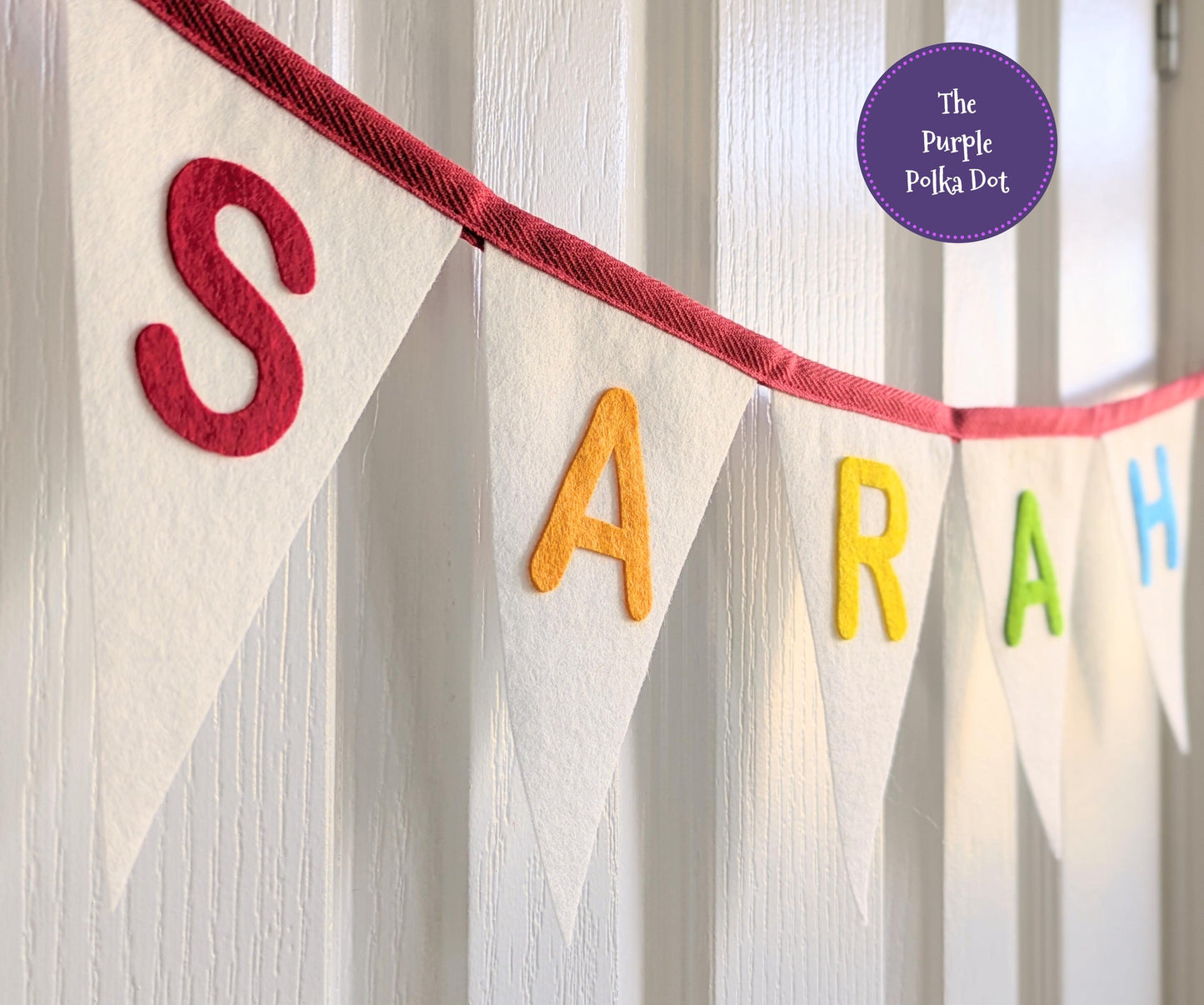 Custom personalised felt bunting with rainbow hand-cut lettering