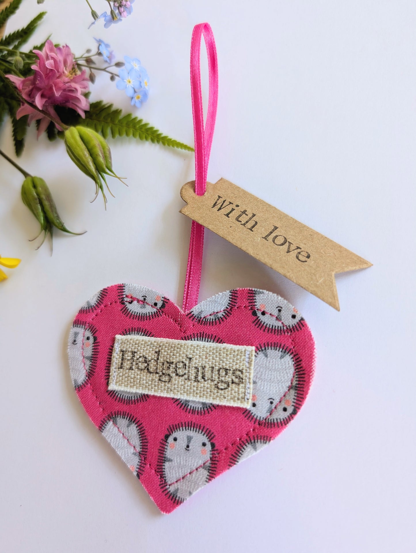 Hedgehugs pink hanging heart decoration with plantable wildflower seed backing card