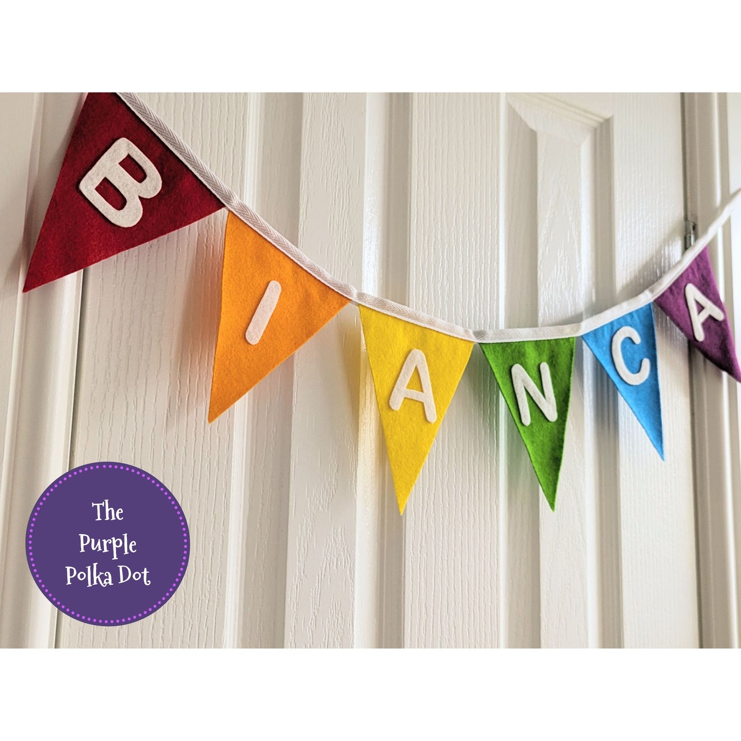 Custom personalised rainbow felt bunting with hand-cut lettering