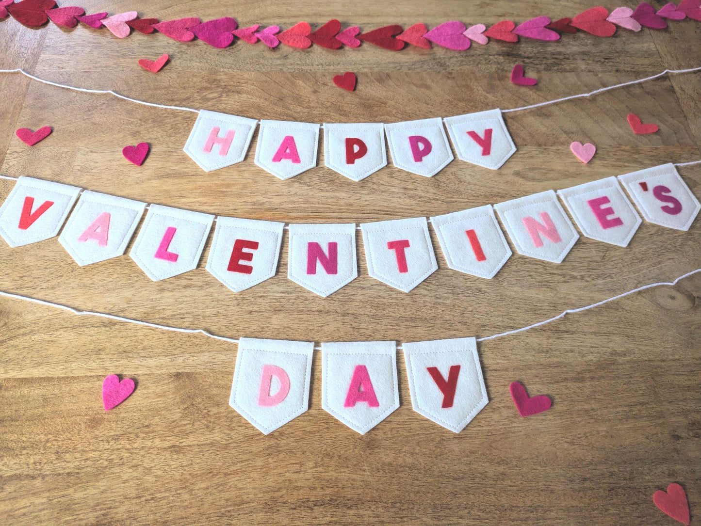 Felt Valentine's Day Banner: Handmade off-white bunting with pink and red lettering
