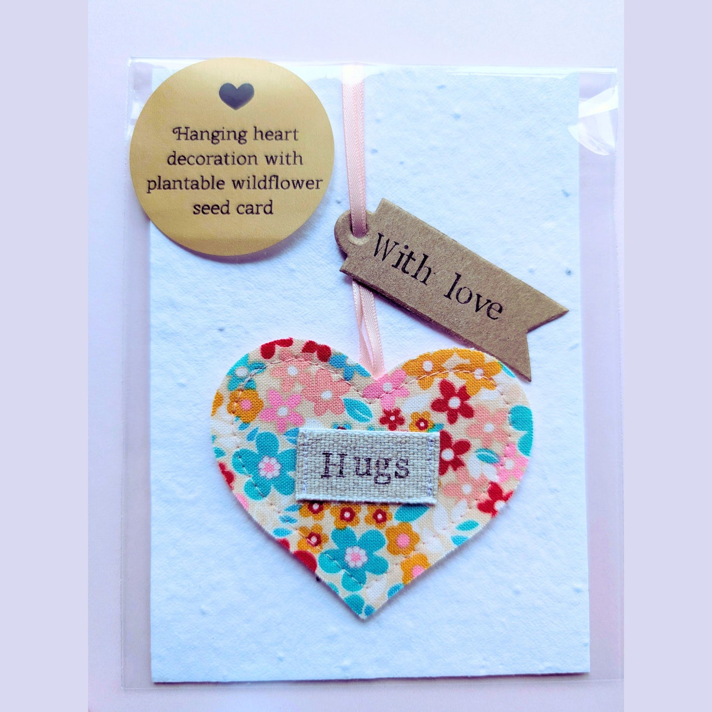 'Hugs' Hanging Heart Decoration with Recycled Plantable Wildflower Seed Backing Card - Pink and Turquoise