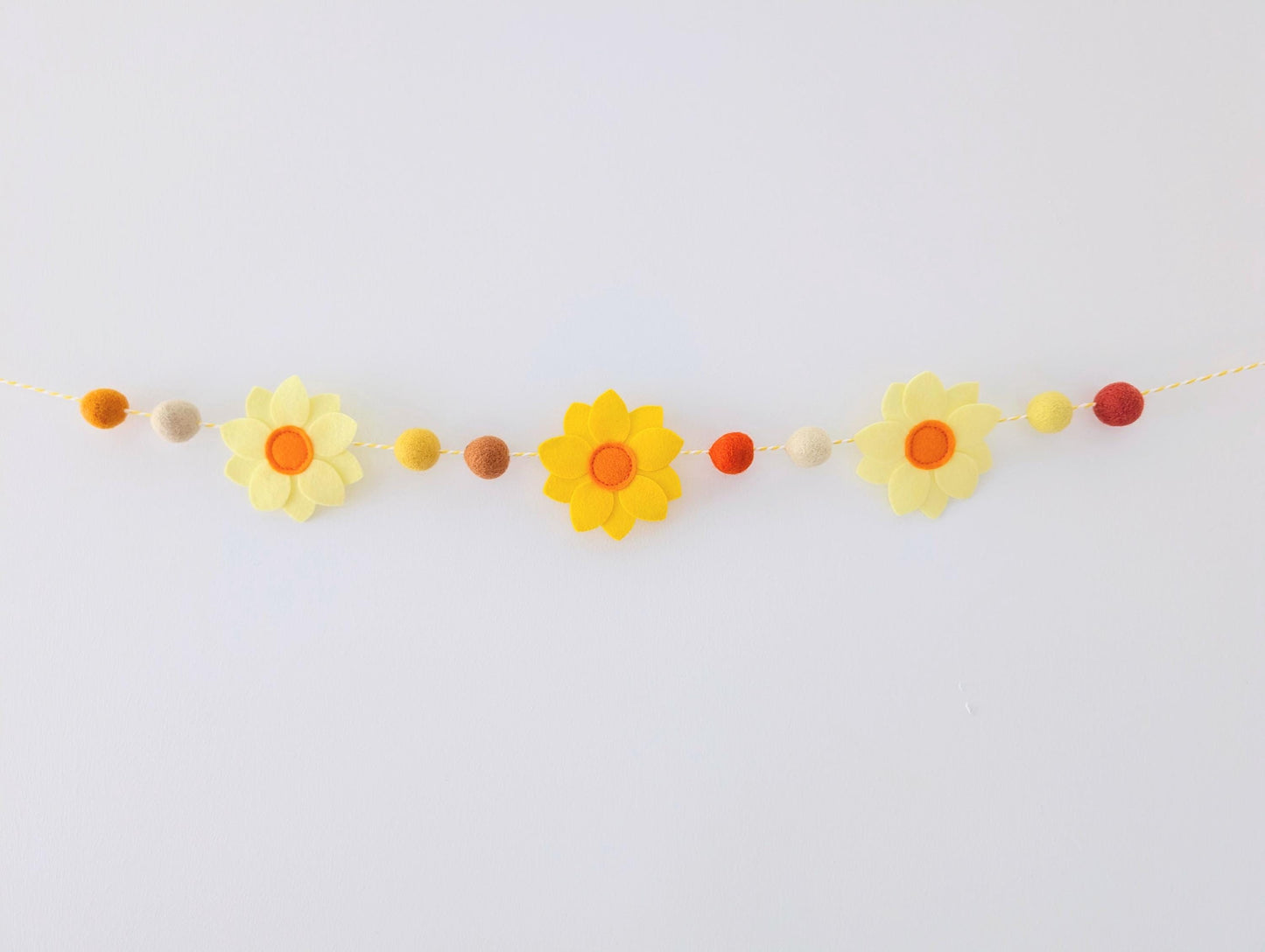 Yellow daffodil and felt ball garland: floral spring or Easter bunting