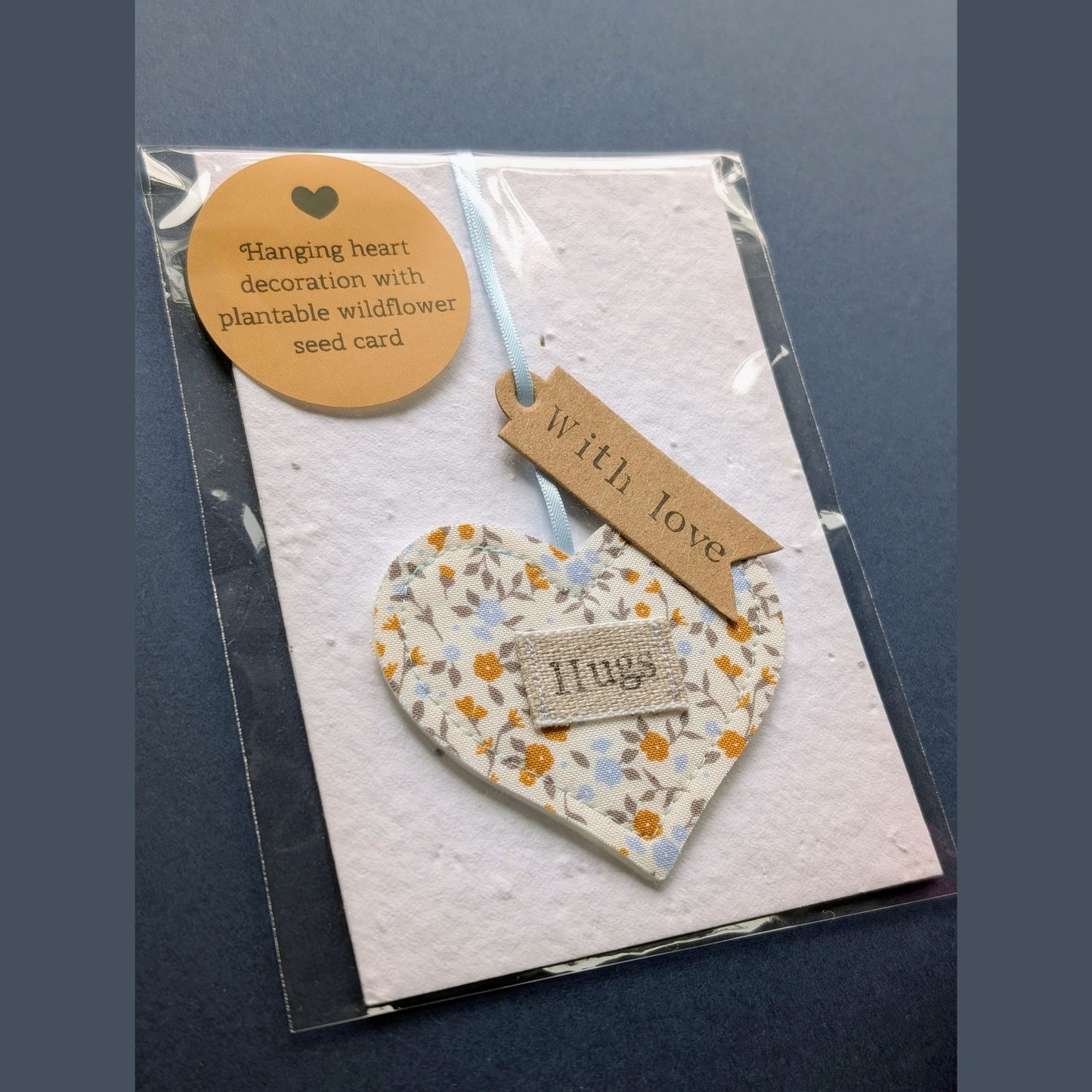 'Hugs' Hanging Decoration with Recycled Plantable Wildflower Seed Backing Card - Blue and Ochre Floral