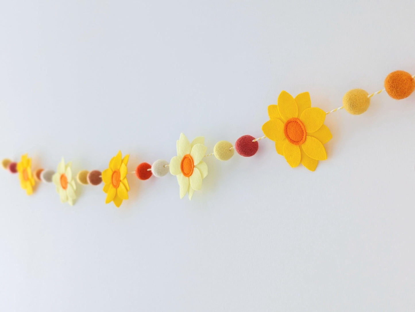 Yellow daffodil and felt ball garland: floral spring or Easter bunting