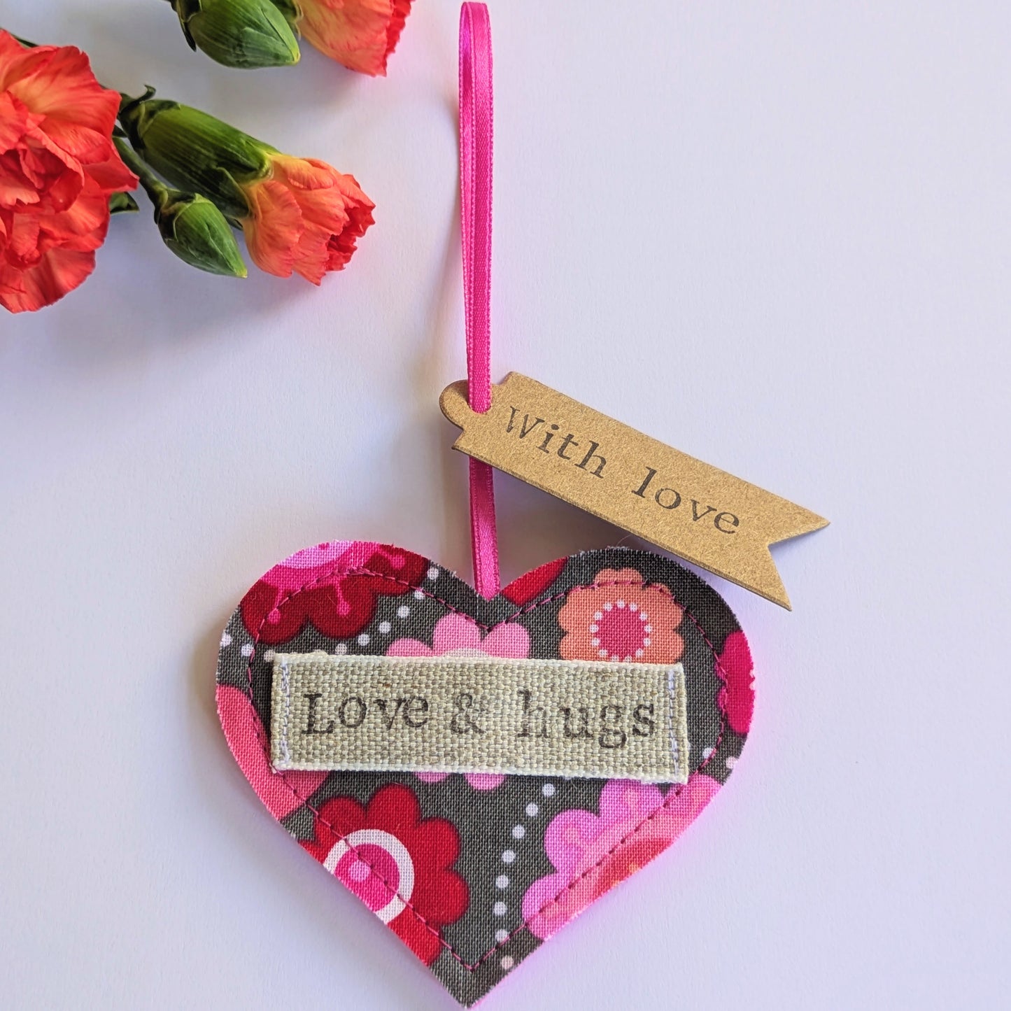 'Love & hugs' Hanging Heart Decoration with Plantable Wildflower Seed Backing Card