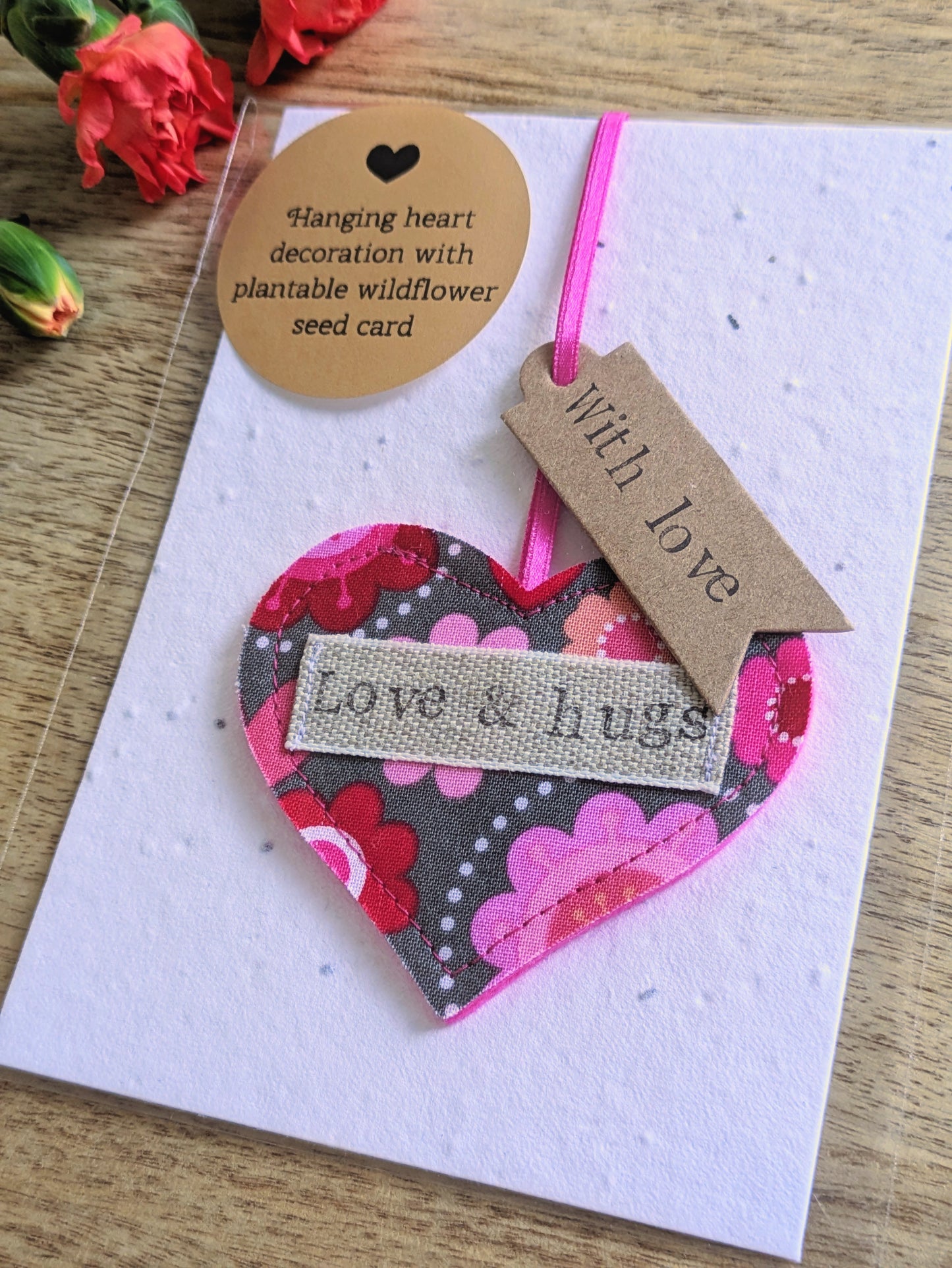 'Love & hugs' Hanging Heart Decoration with Plantable Wildflower Seed Backing Card