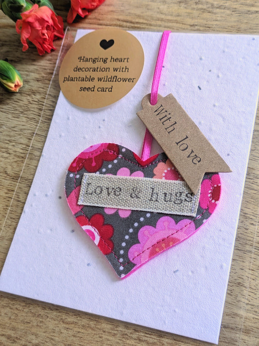 'Love & hugs' Hanging Heart Decoration with Plantable Wildflower Seed Backing Card