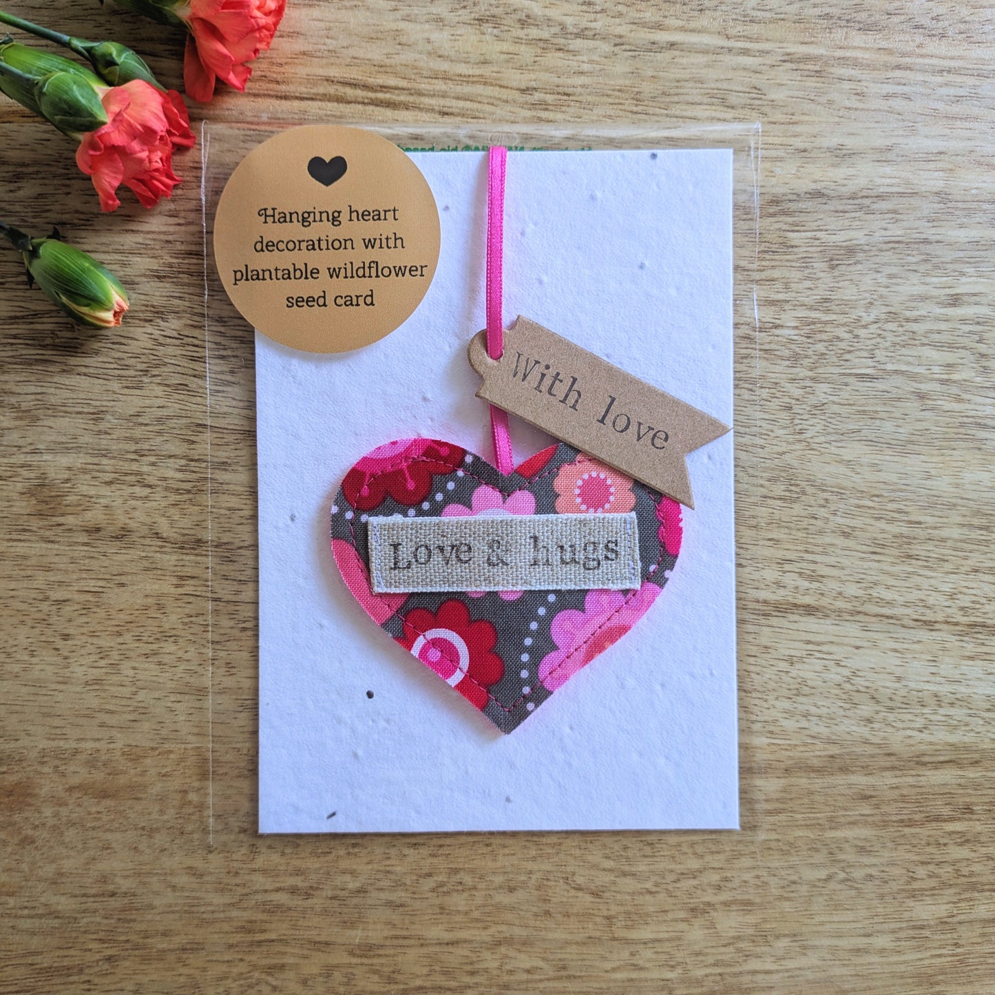 'Love & hugs' Hanging Heart Decoration with Plantable Wildflower Seed Backing Card