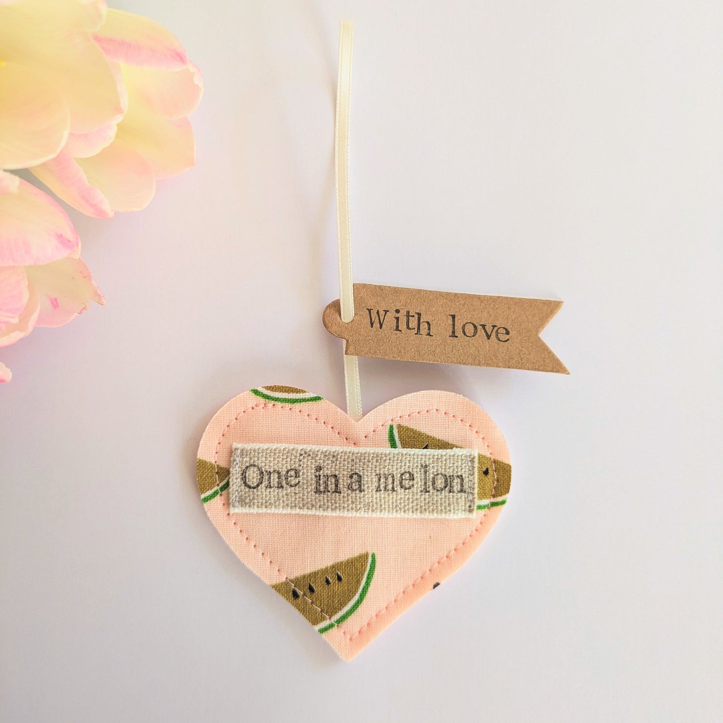 'One in a melon' hanging heart decoration with recycled plantable wildflower seed backing card