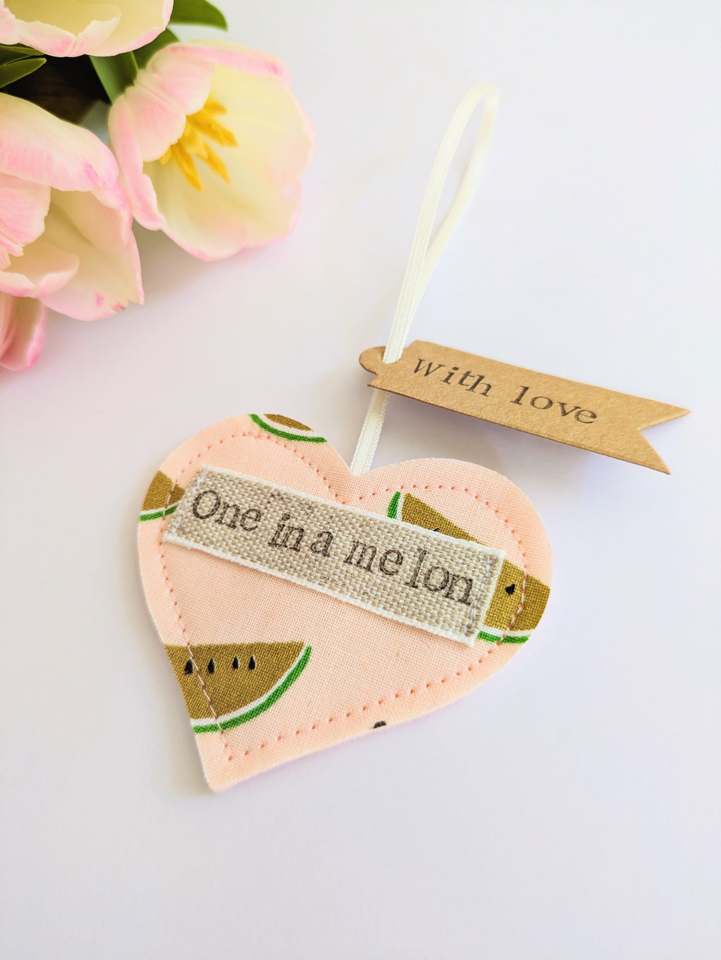 'One in a melon' hanging heart decoration with recycled plantable wildflower seed backing card