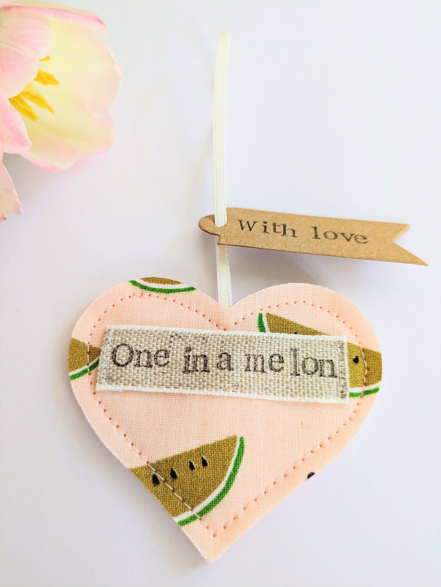 'One in a melon' hanging heart decoration with recycled plantable wildflower seed backing card