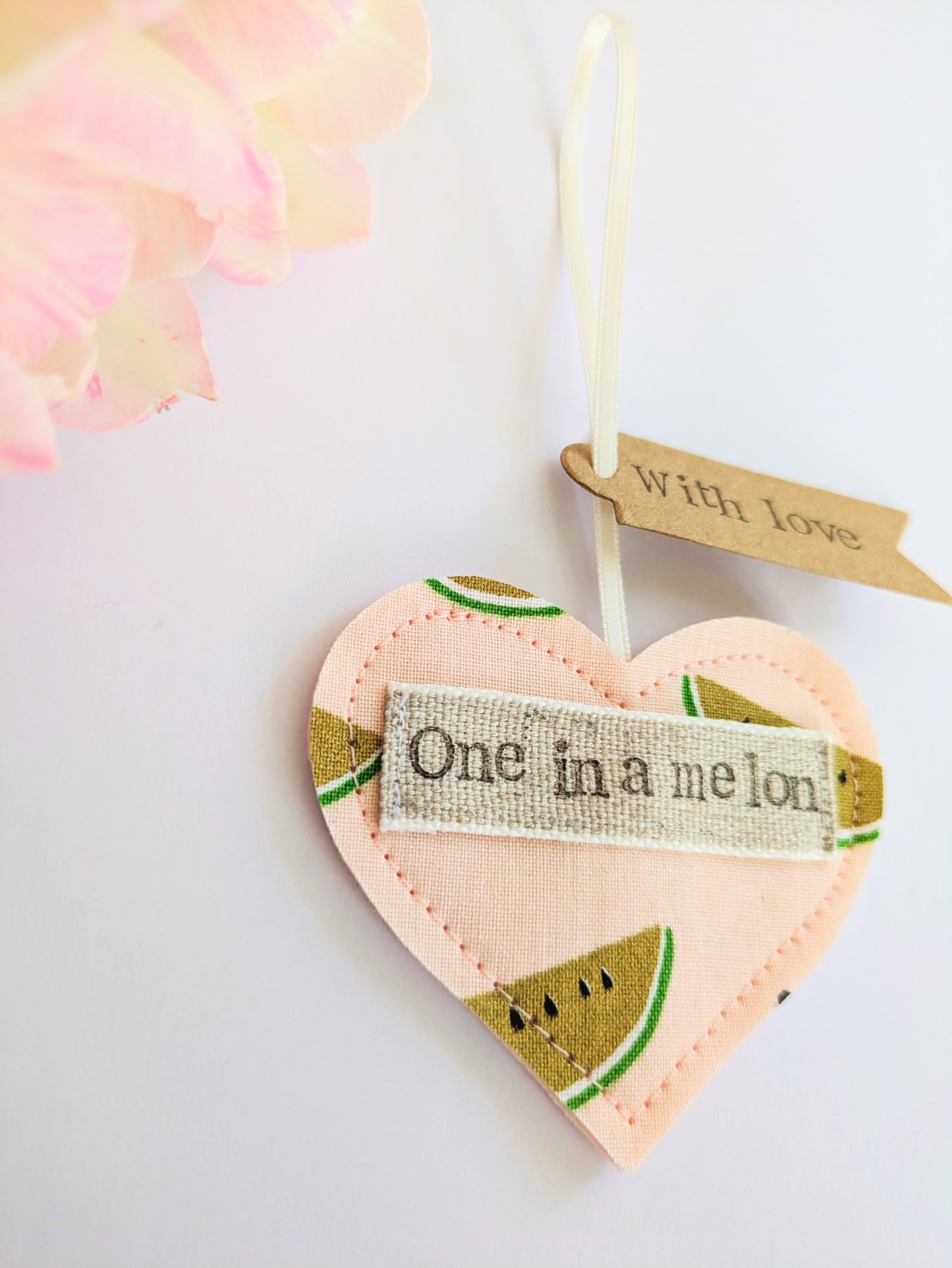 'One in a melon' hanging heart decoration with recycled plantable wildflower seed backing card