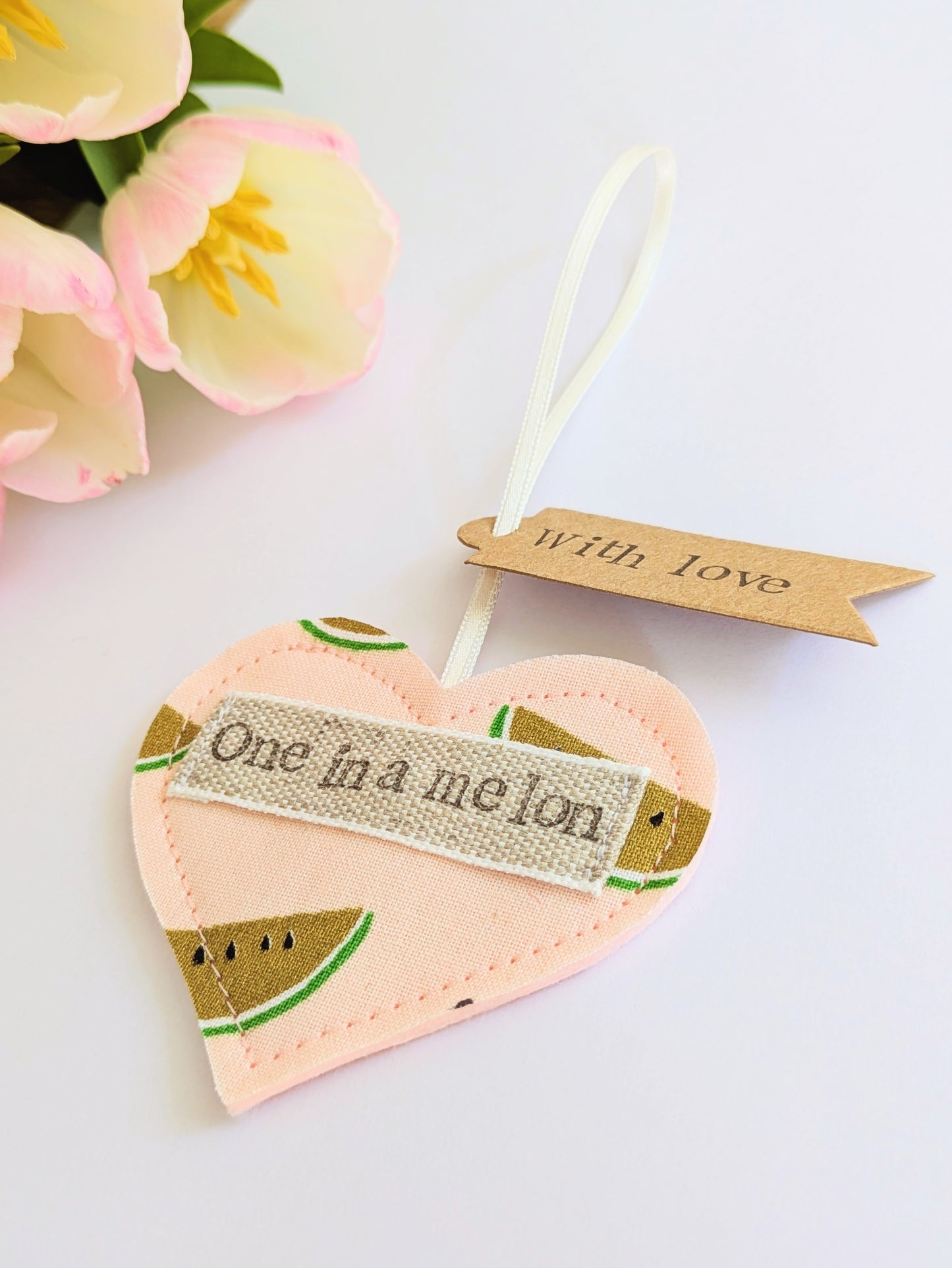 'One in a melon' hanging heart decoration with recycled plantable wildflower seed backing card