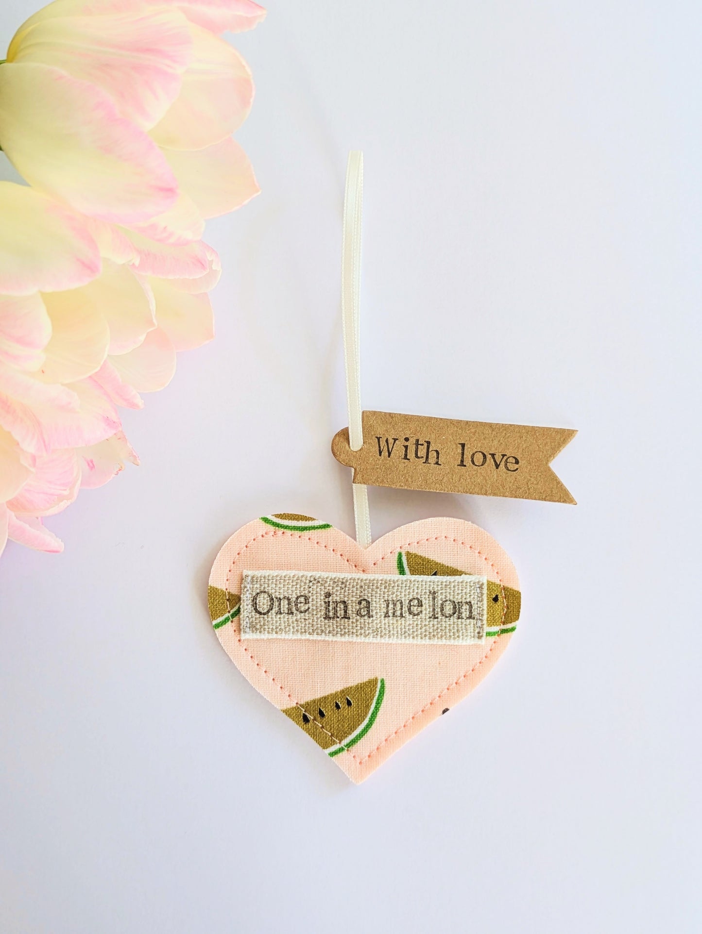 'One in a melon' hanging heart decoration with recycled plantable wildflower seed backing card