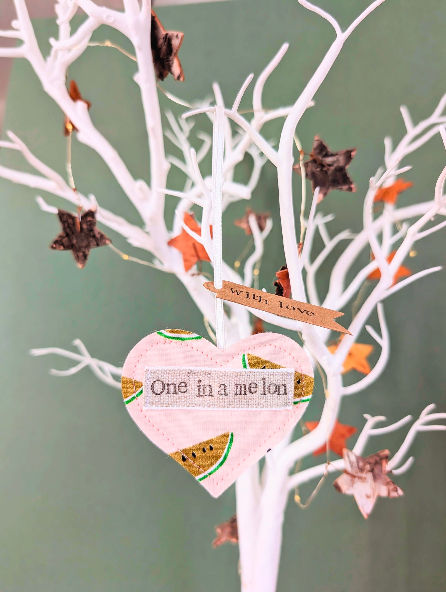 'One in a melon' hanging heart decoration with recycled plantable wildflower seed backing card