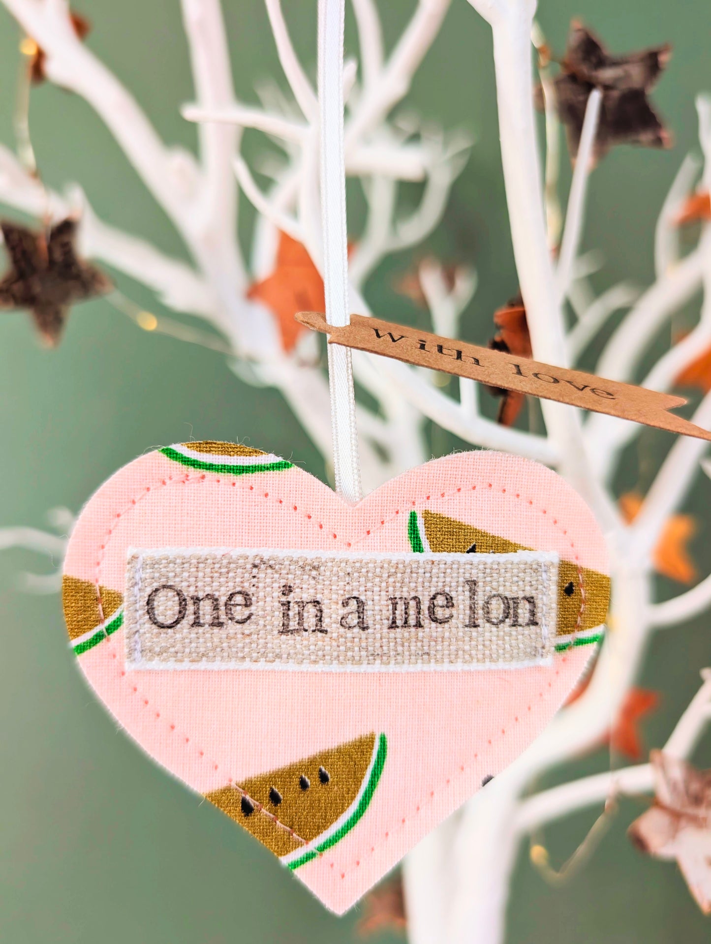'One in a melon' hanging heart decoration with recycled plantable wildflower seed backing card