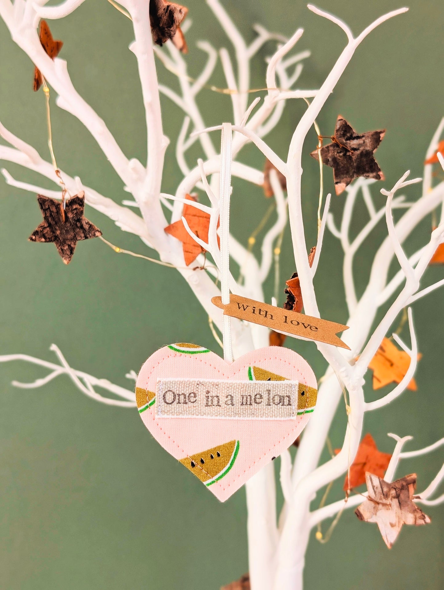 'One in a melon' hanging heart decoration with recycled plantable wildflower seed backing card