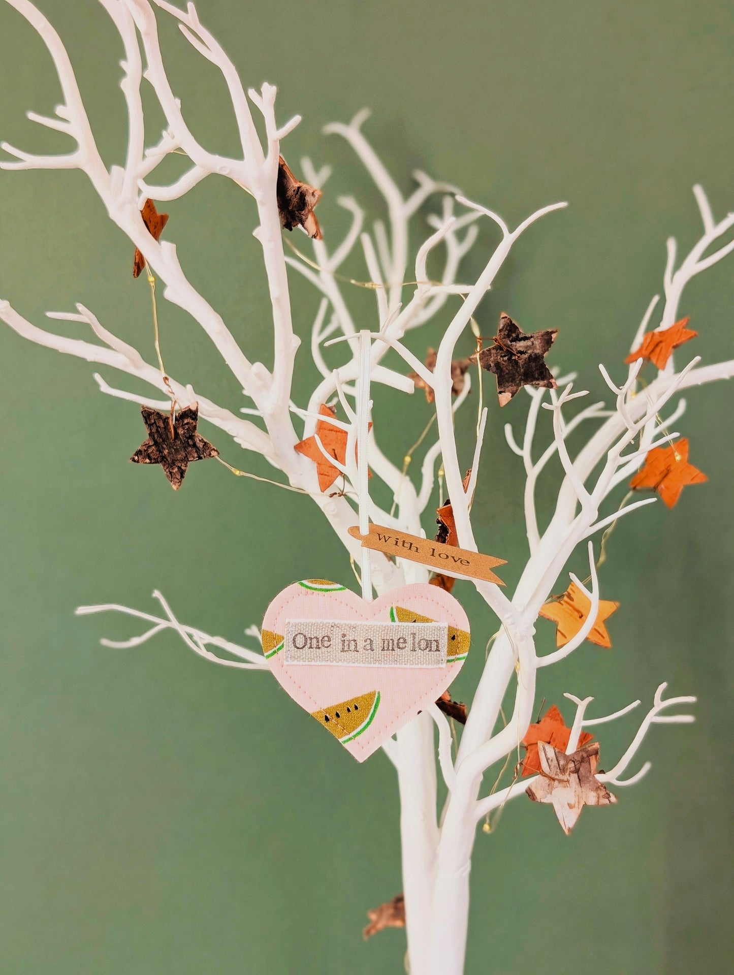 'One in a melon' hanging heart decoration with recycled plantable wildflower seed backing card