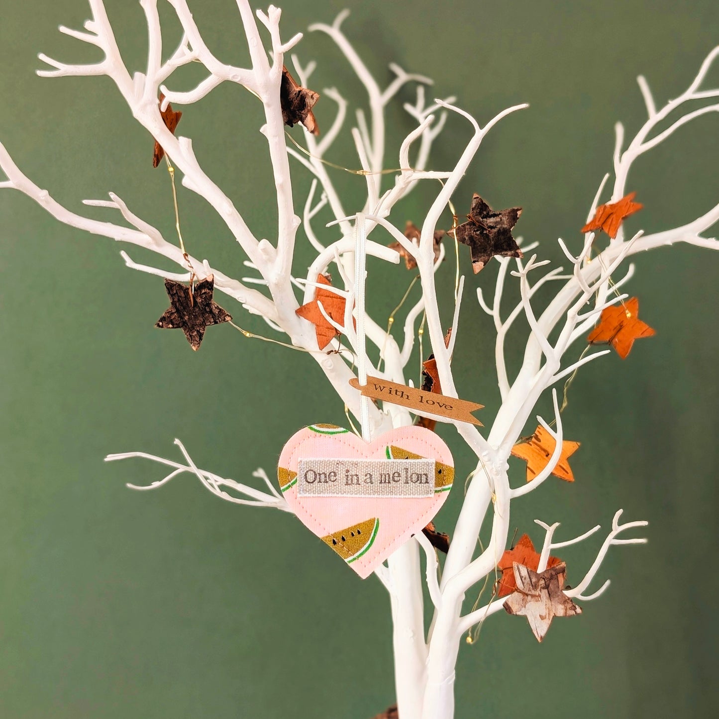 'One in a melon' hanging heart decoration with recycled plantable wildflower seed backing card