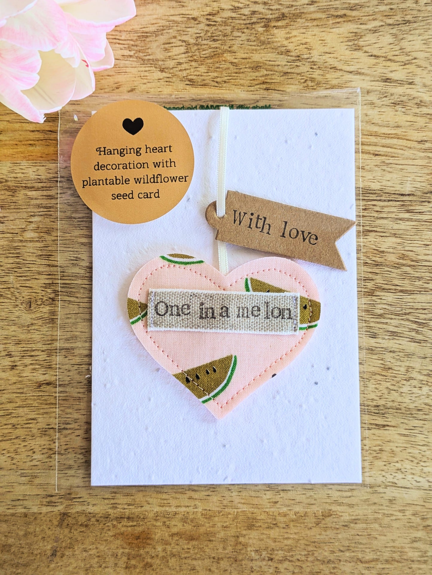 'One in a melon' hanging heart decoration with recycled plantable wildflower seed backing card