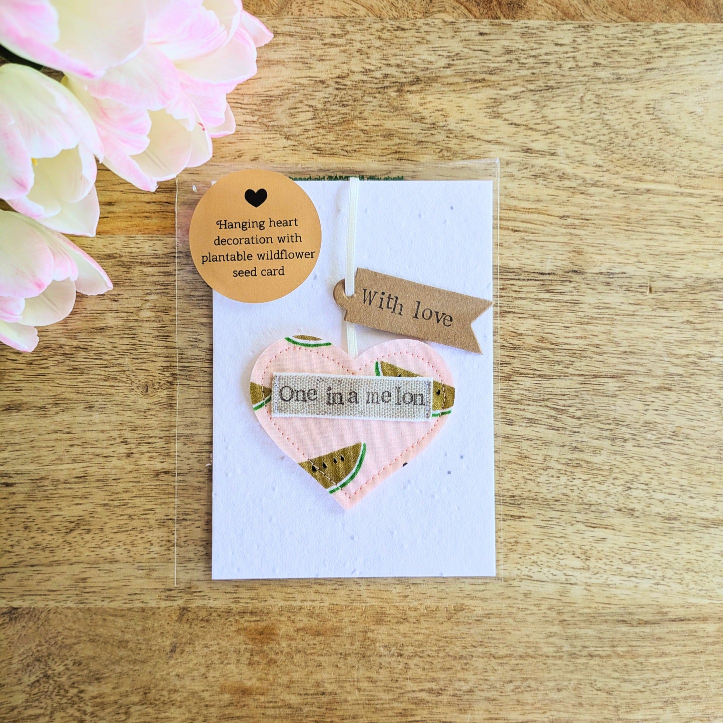'One in a melon' hanging heart decoration with recycled plantable wildflower seed backing card