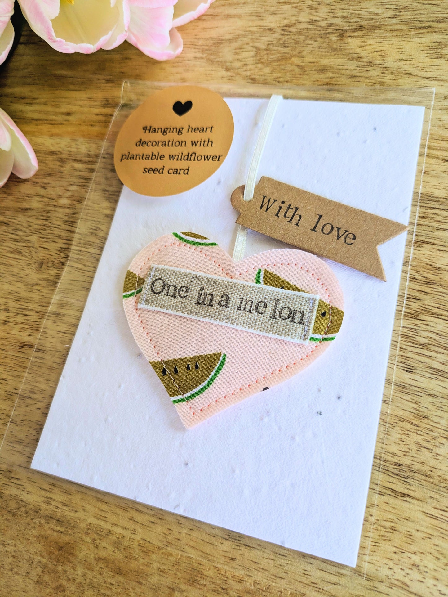 'One in a melon' hanging heart decoration with recycled plantable wildflower seed backing card