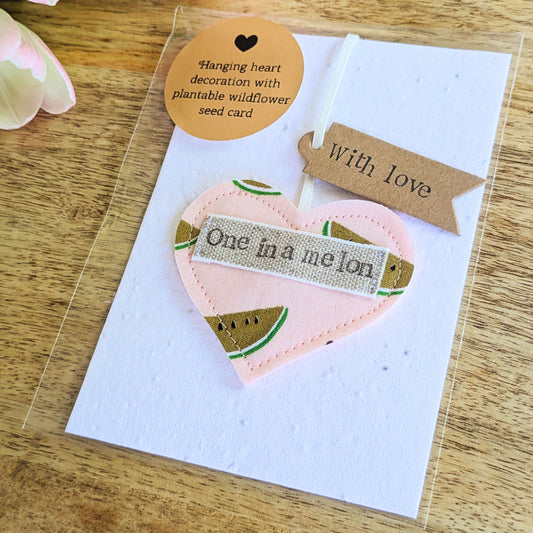 'One in a melon' hanging heart decoration with recycled plantable wildflower seed backing card