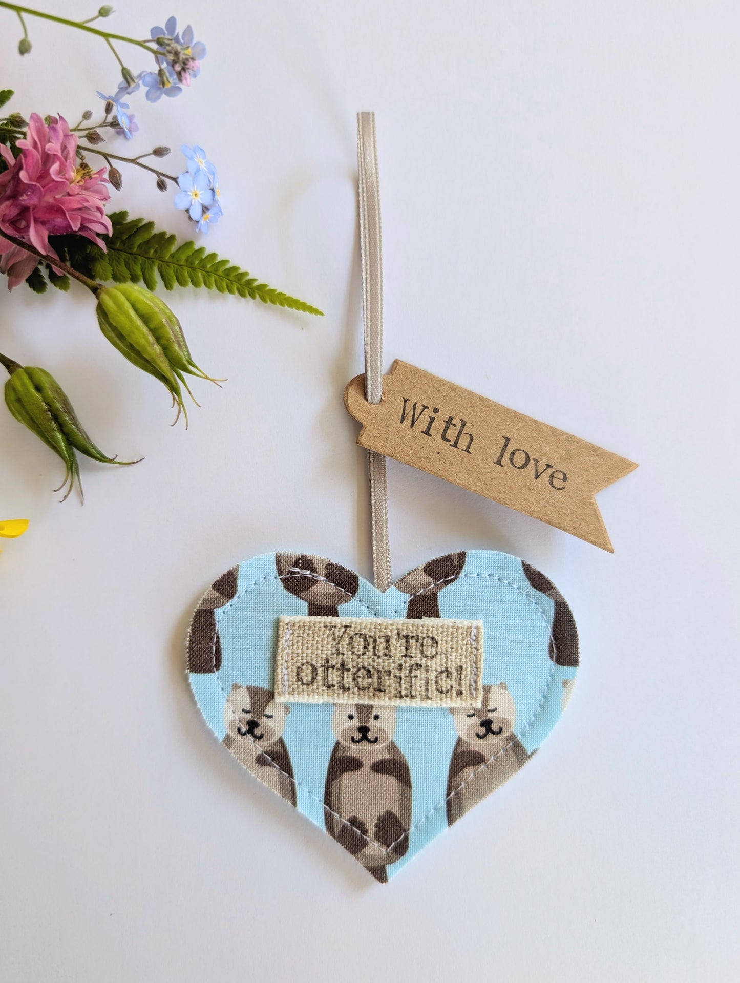 'You're otterific!' hanging heart decoration with plantable wildflower seed backing card