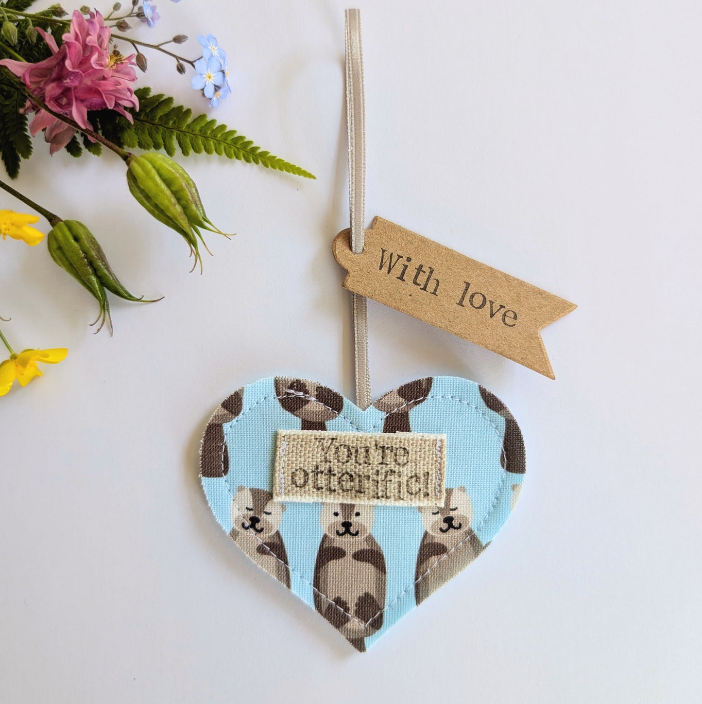 'You're otterific!' hanging heart decoration with plantable wildflower seed backing card