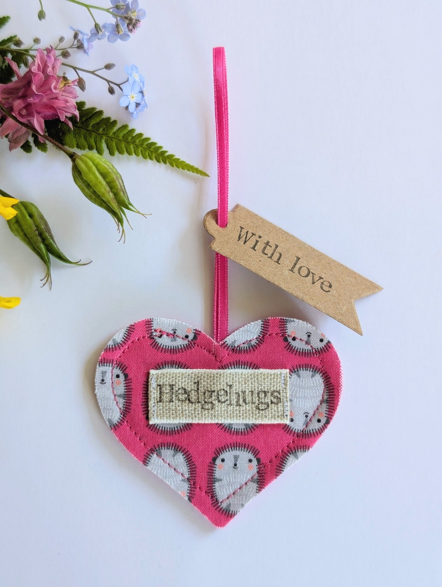 Hedgehugs pink hanging heart decoration with plantable wildflower seed backing card