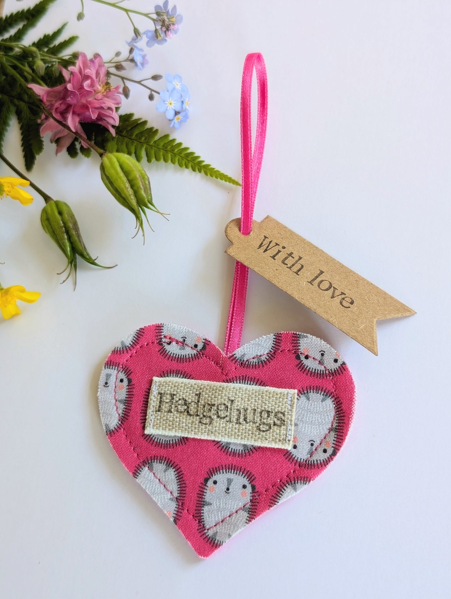 Hedgehugs pink hanging heart decoration with plantable wildflower seed backing card