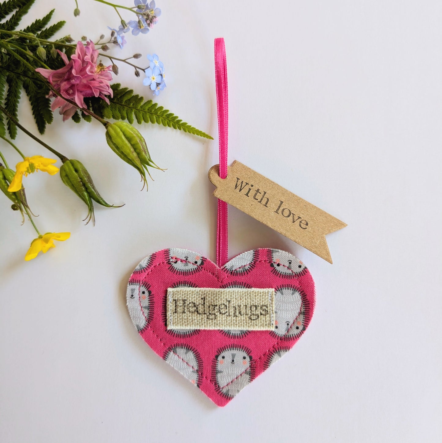 Hedgehugs pink hanging heart decoration with plantable wildflower seed backing card