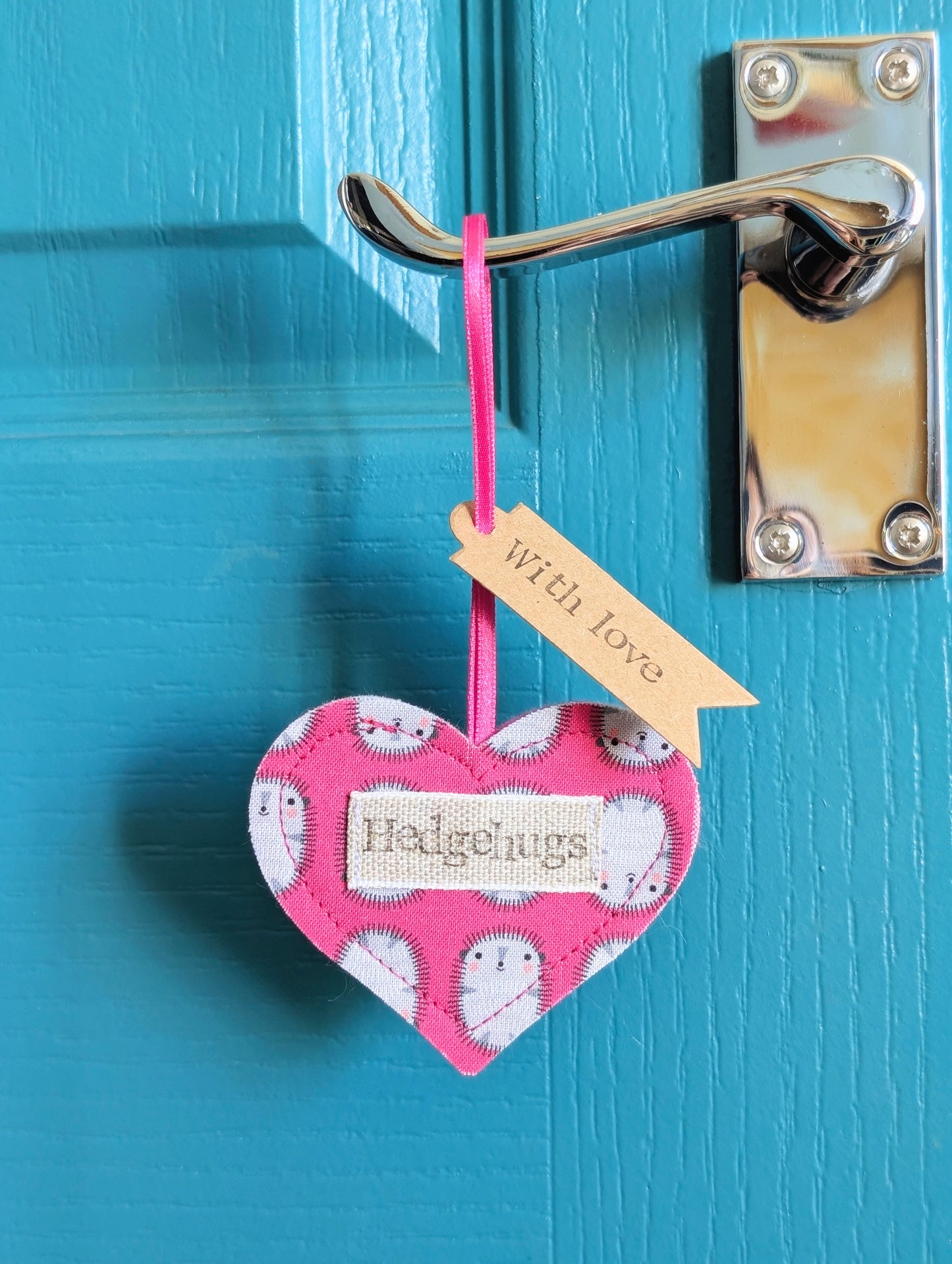 Hedgehugs pink hanging heart decoration with plantable wildflower seed backing card