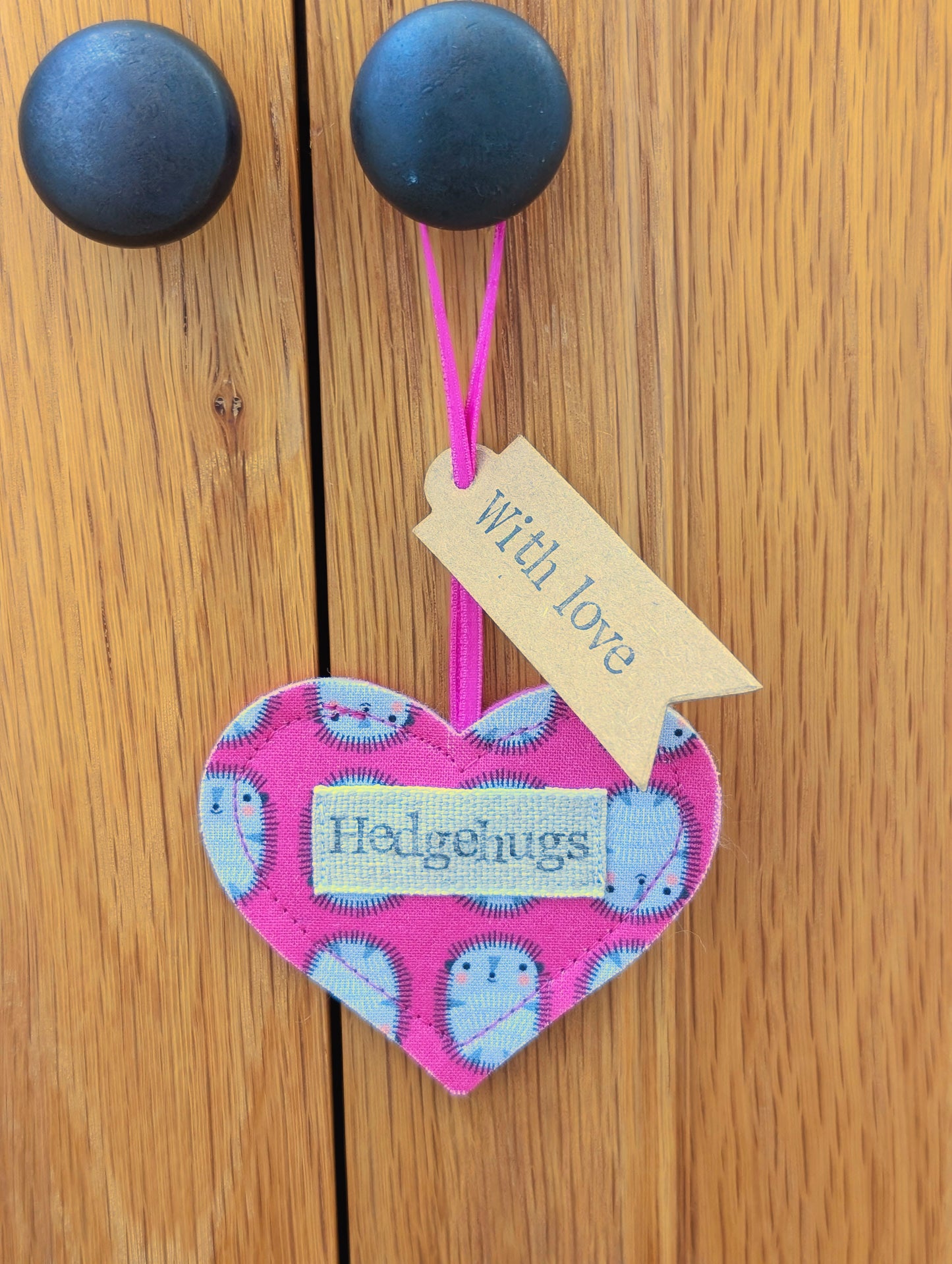 Hedgehugs pink hanging heart decoration with plantable wildflower seed backing card