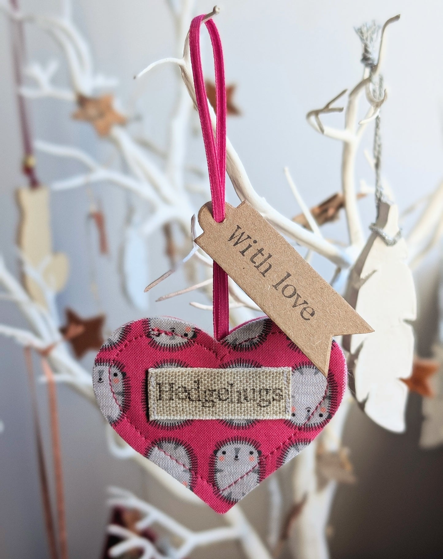 Hedgehugs pink hanging heart decoration with plantable wildflower seed backing card