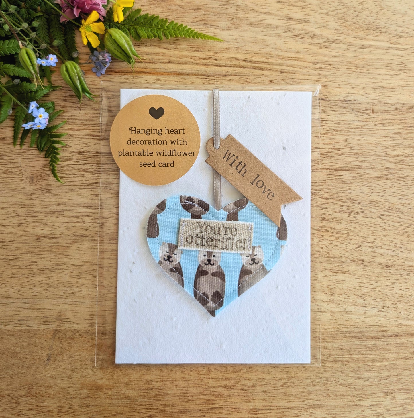'You're otterific!' hanging heart decoration with plantable wildflower seed backing card