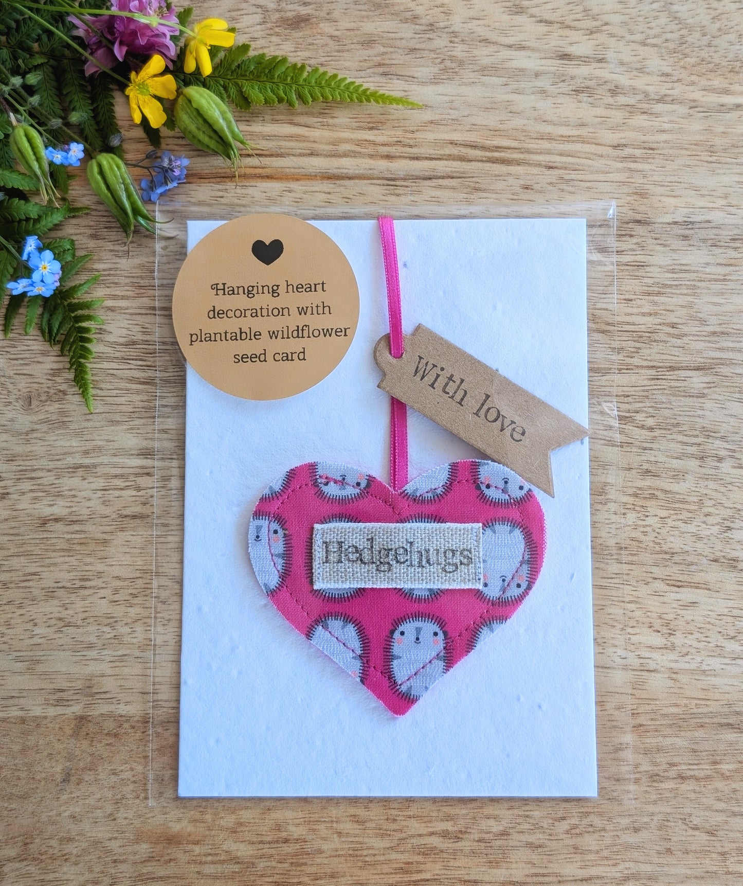 Hedgehugs pink hanging heart decoration with plantable wildflower seed backing card