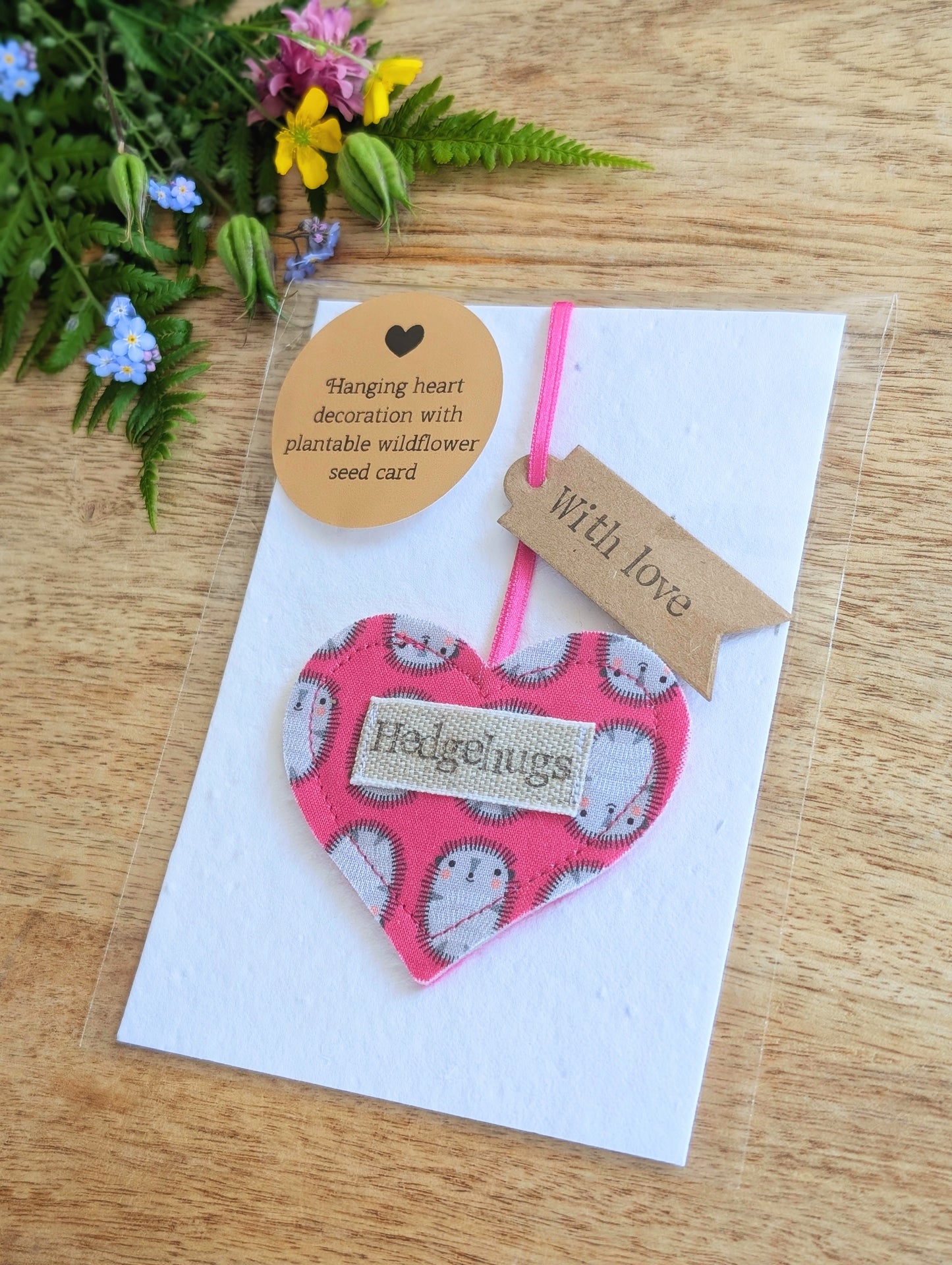 Hedgehugs pink hanging heart decoration with plantable wildflower seed backing card