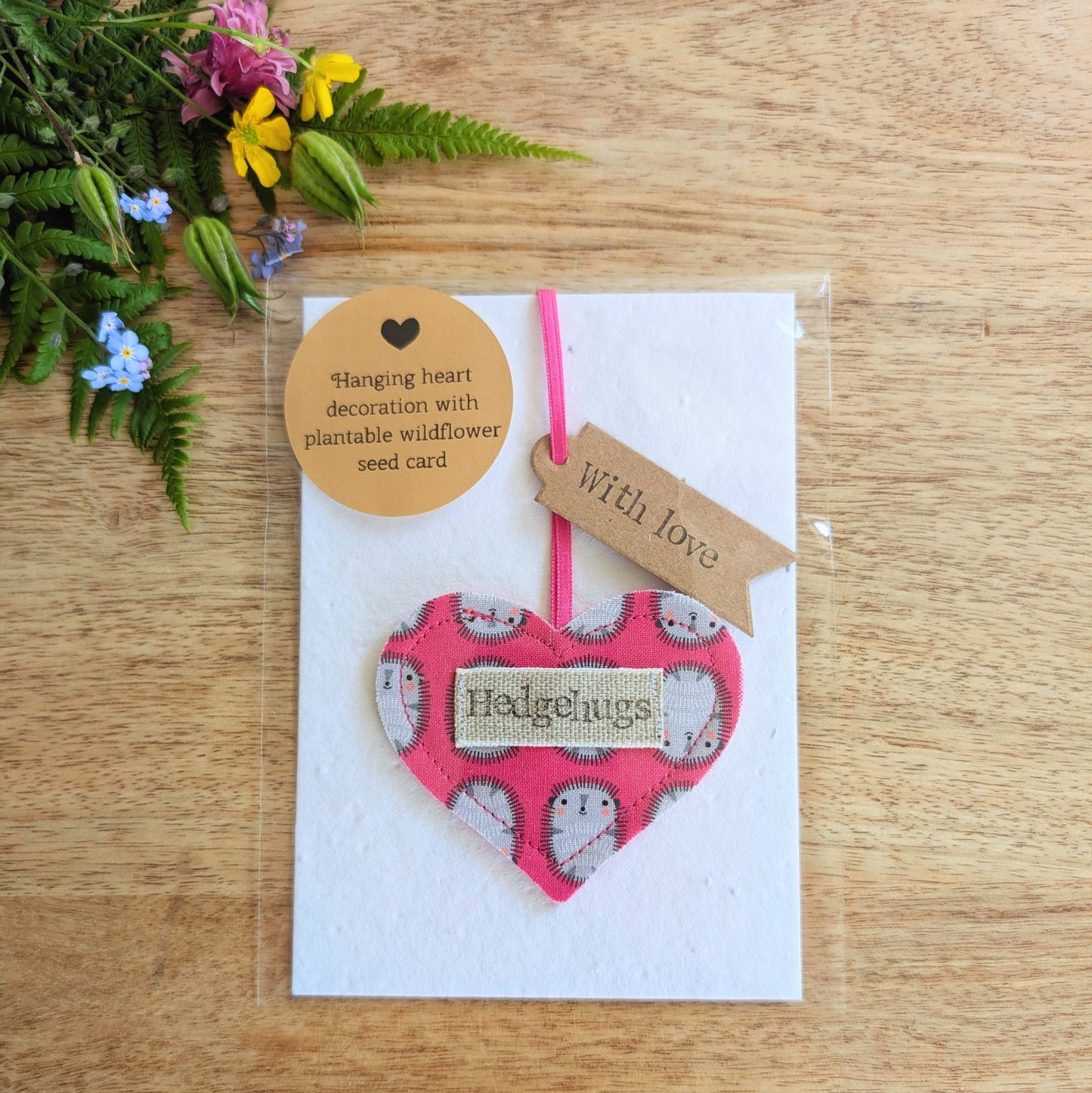 Hedgehugs pink hanging heart decoration with plantable wildflower seed backing card