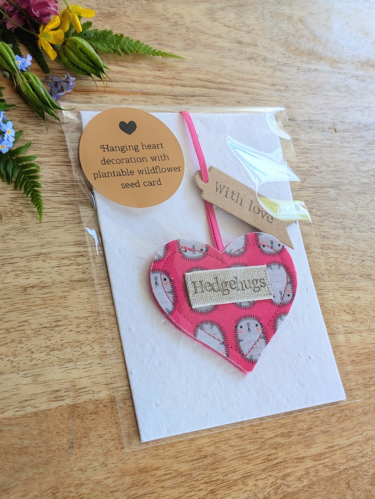 Hedgehugs pink hanging heart decoration with plantable wildflower seed backing card