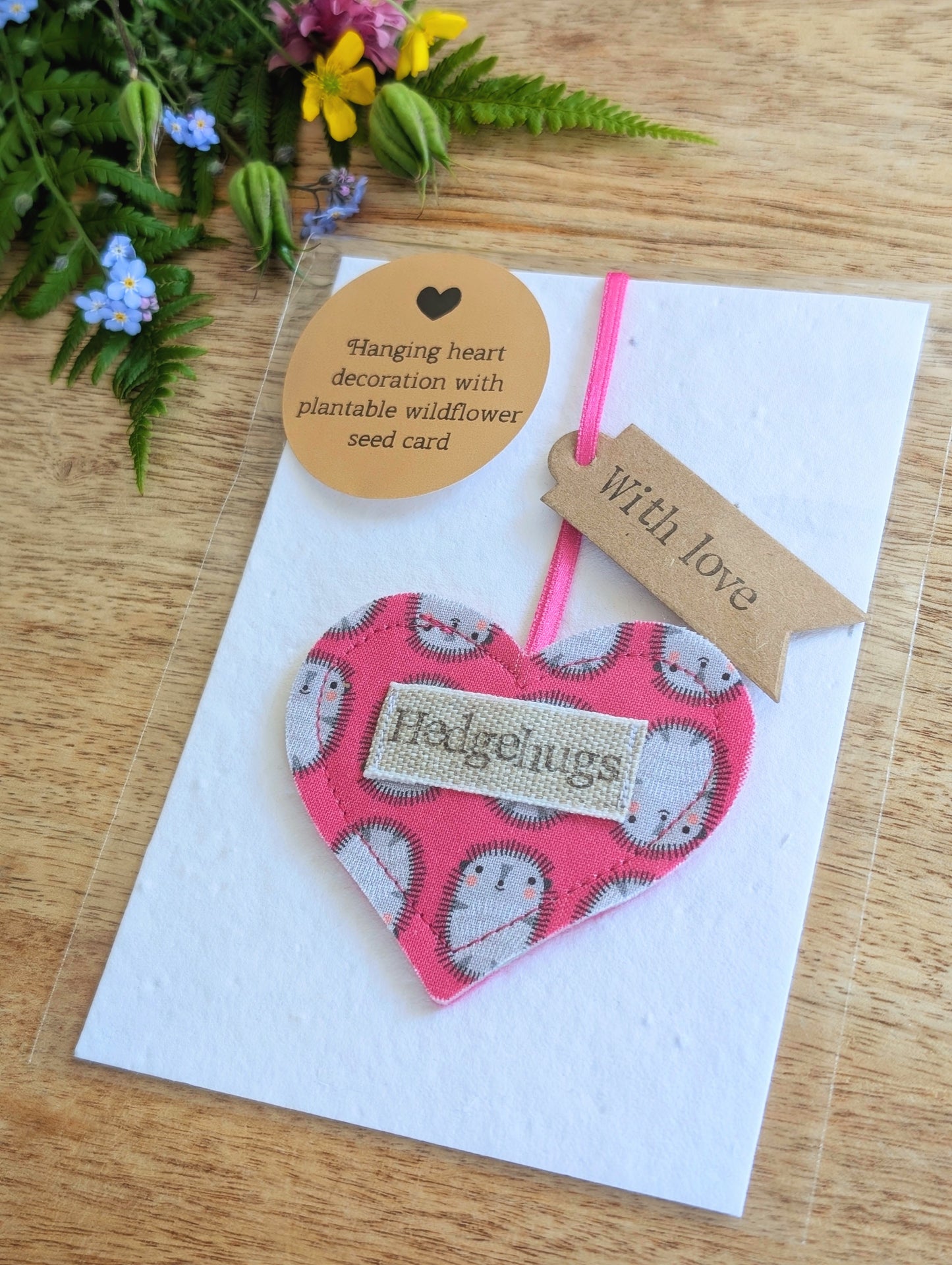 Hedgehugs pink hanging heart decoration with plantable wildflower seed backing card