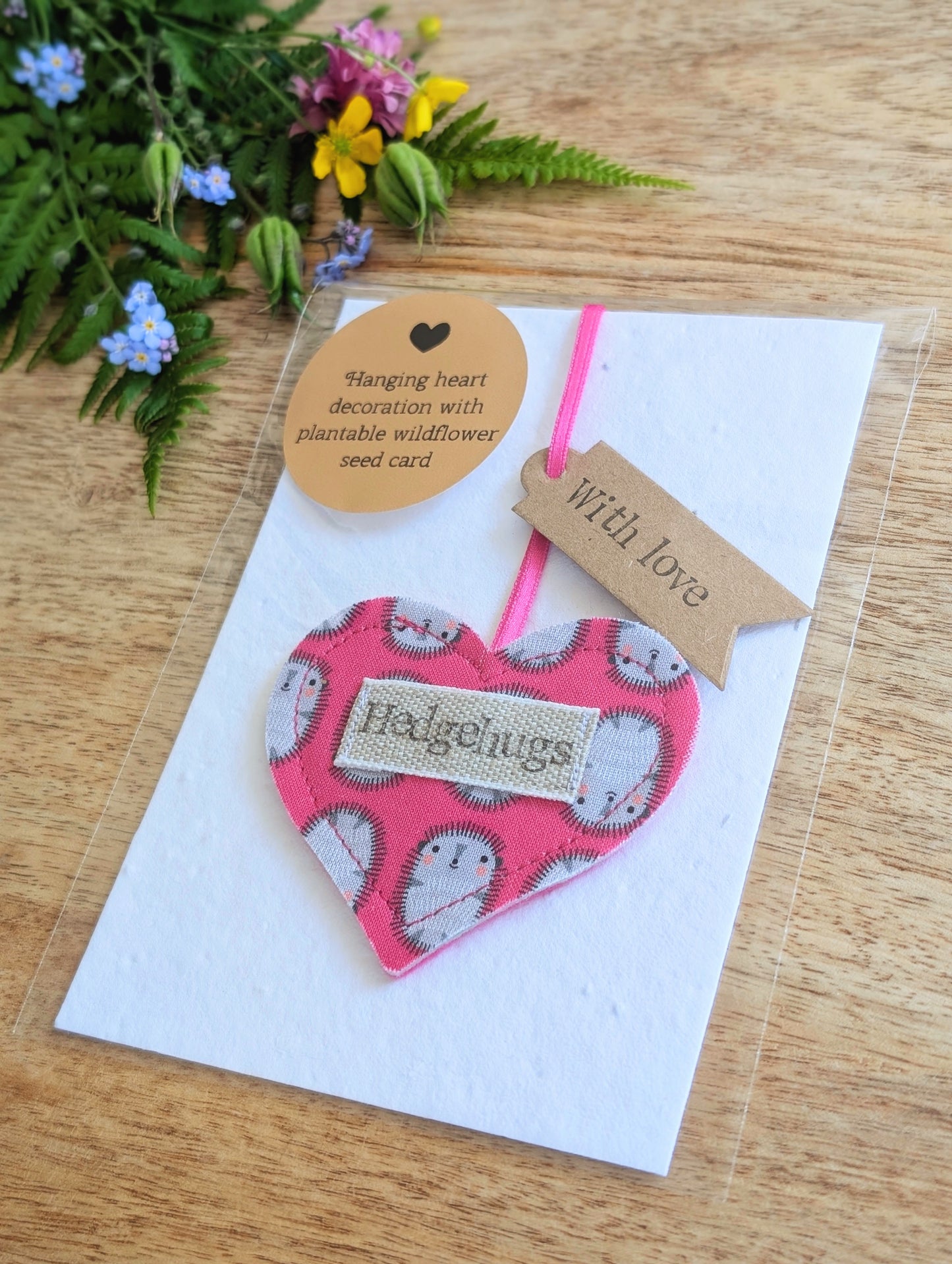 Hedgehugs pink hanging heart decoration with plantable wildflower seed backing card